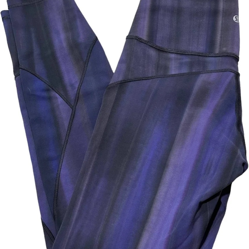 Size 6 lululemon In Movement Tight 25” Spray Dye Everlux in color Lunar Purple